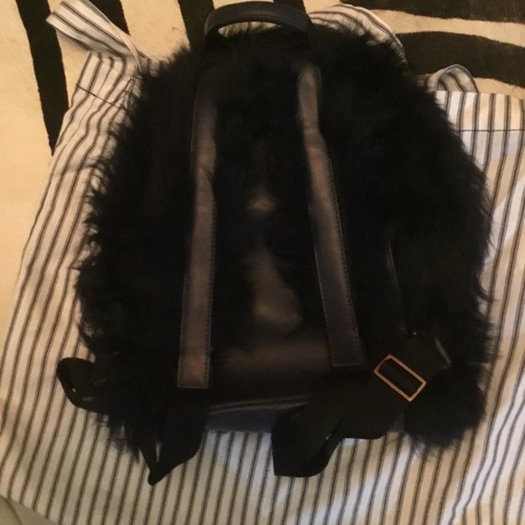 Anya Hindmarch shearling eyes backpack New